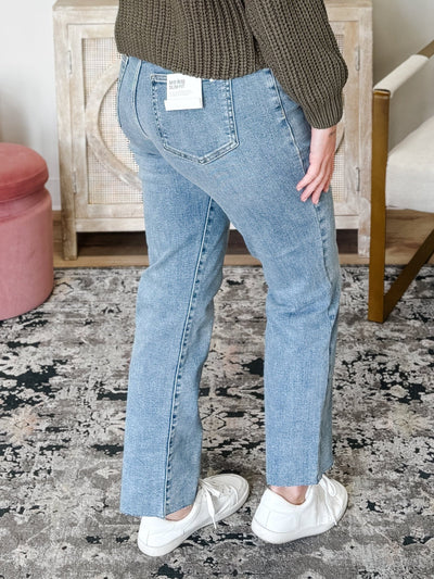 Mid Rise Slim Straight Jeans With Raw Cut Hem