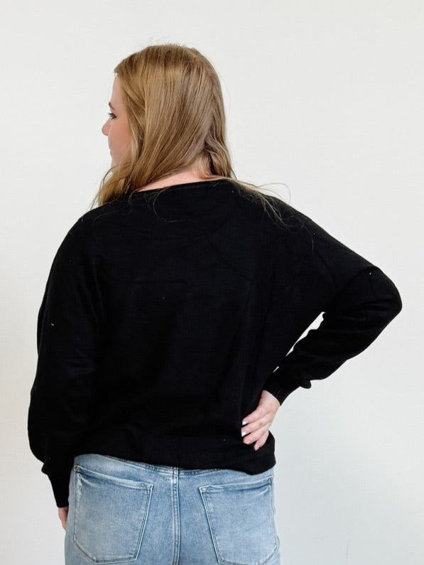 Front Seam Round Neck Sweater in Black
